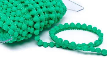 Pompons Baby Smaragd