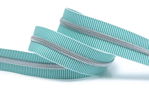 Reissverschluss 6mm Metallic Streifen Tuerkis Weiss 20-406-036001.jpg