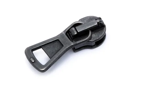 Reissverschlussgleiter Metallic 6 mm Altsilber Konisch 25-106-002102.jpg